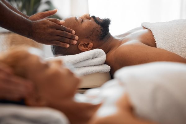 relax-man-head-massage-and-couple-on-spa-massage-table-for-facial-wellness-and-stress-relief-ther.jpg couples massage